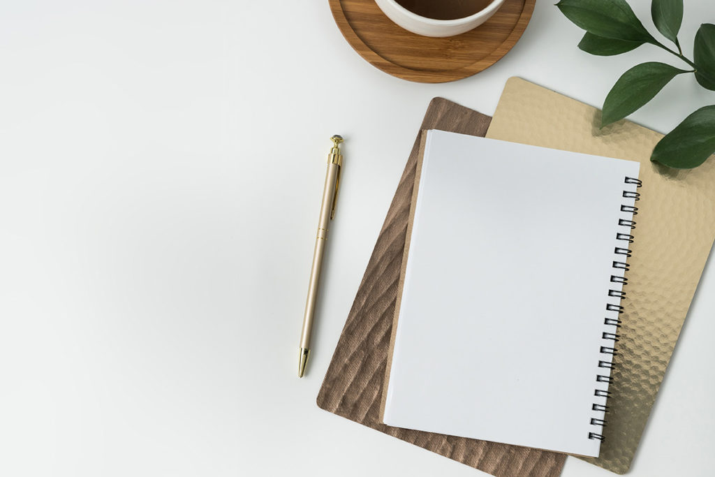 Notebook,pen,andcoffee(forweb,whitebackground) Texas Catholic